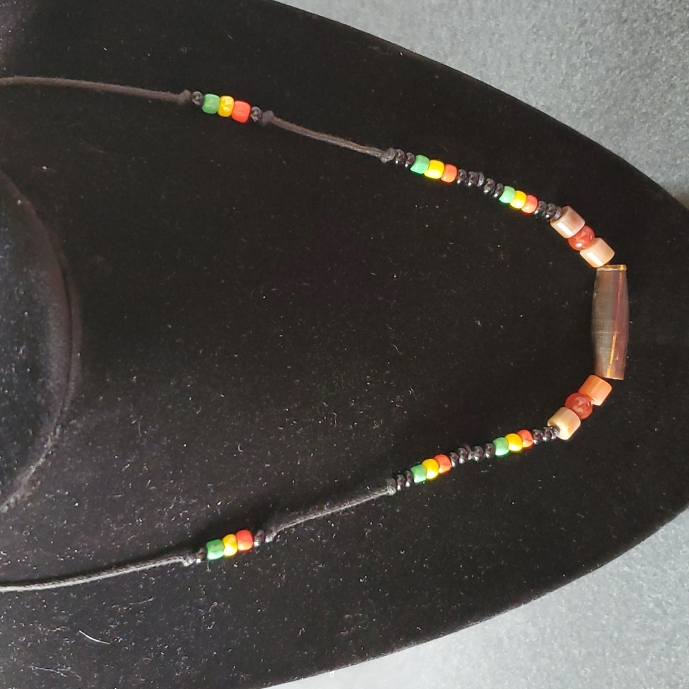 Carved horn necklace.